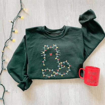 Adorable cat Christmas sweatshirt for women, perfect gift for cat lovers, featuring festive holiday design and cute Xmas graphic for cozy winter days