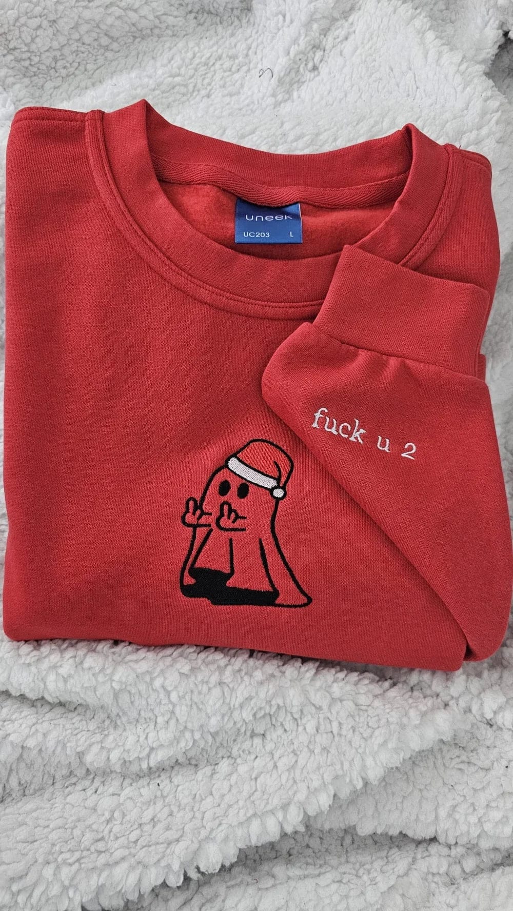 Weihnachtshoodies mit Geistermotiv und Mittelfinger 